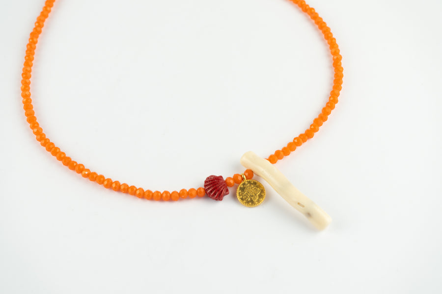 Touching orange necklace