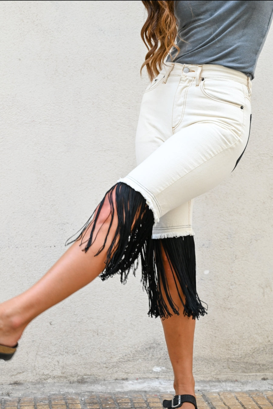 Upcycled denim fringed shorts