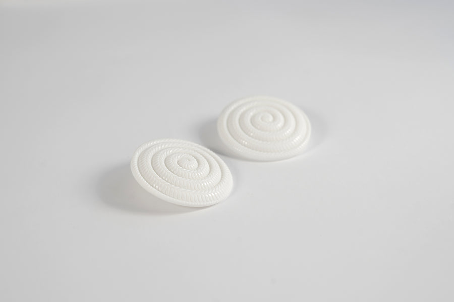 White spiral pin earrings