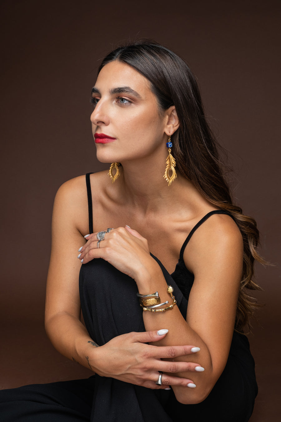 Metallic gold feather earrings