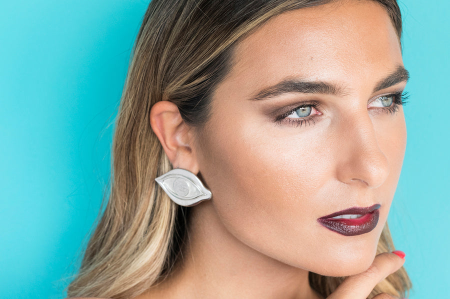 Silver eye earrings