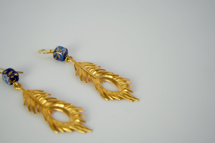 Metallic gold feather earrings