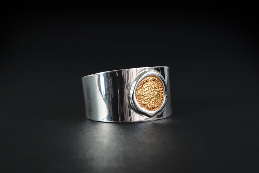 Authentication stamp silver cuff